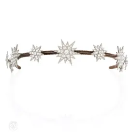 A Swarvoski crystal nine-star headband/bandeau, in palladium plated bronze.  Andrew Prince.  Velvet may be changed to match hair color.