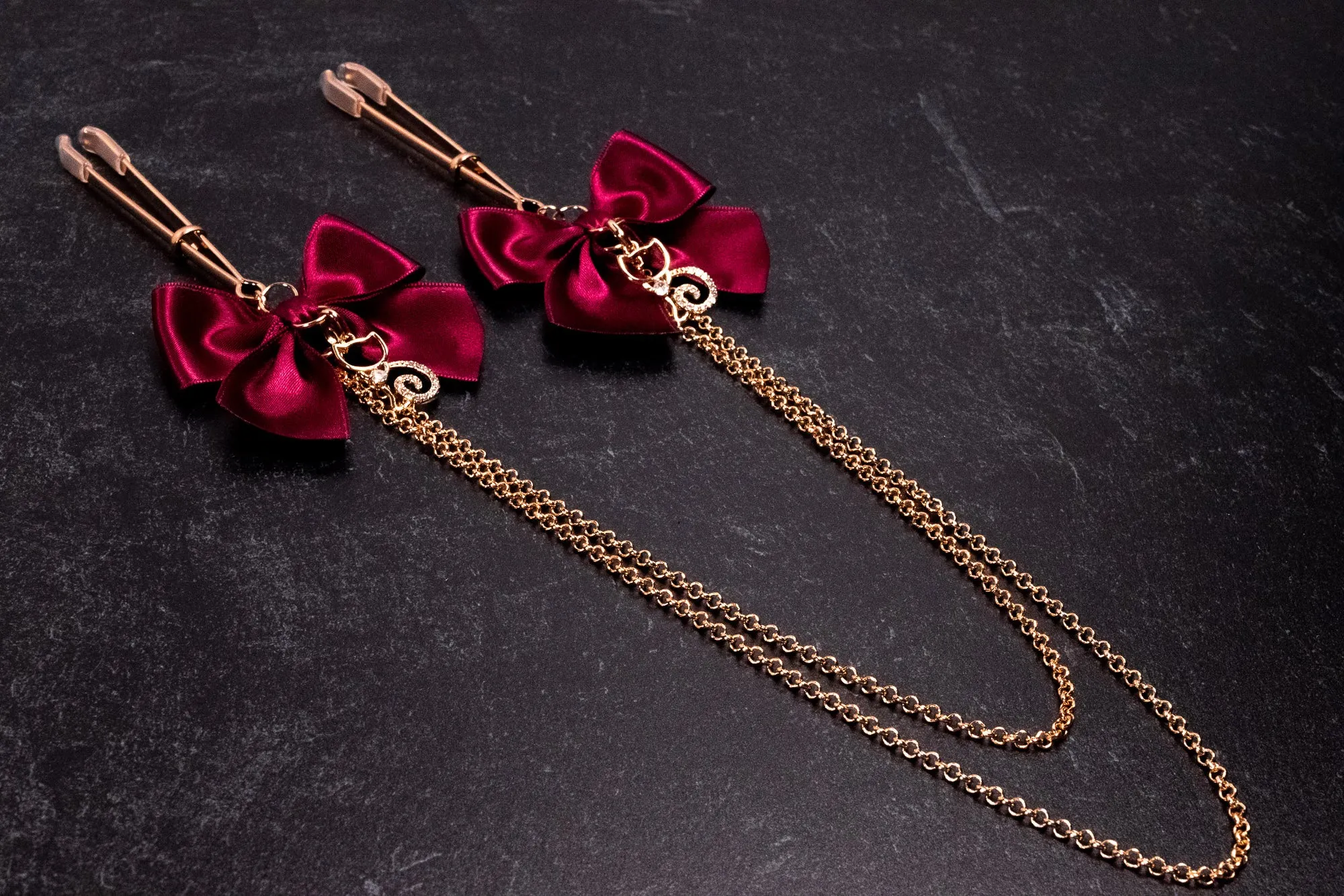 Deluxe Chained Burgundy Bow Tweezer Nipple Clamps in Rose Gold