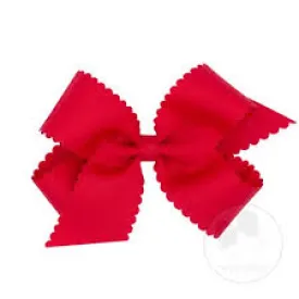 Red scalloped edge grosgrain bow